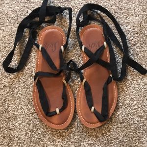 Sseko design lace up shoes.